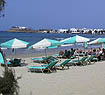 Saint George beach sunbeds and umbrellas