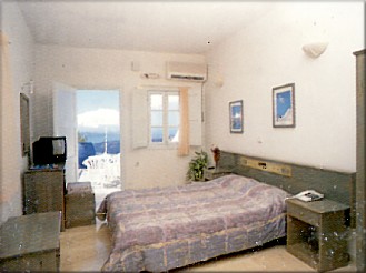 nomikos villas bedroom