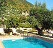 View of the pool and exterior furniture of Agrambeli villa