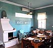 Traditionally decorated dining room with fireplace