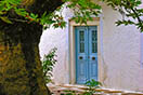 Traditional house at the square of Damarionas village next to the huge plane tree